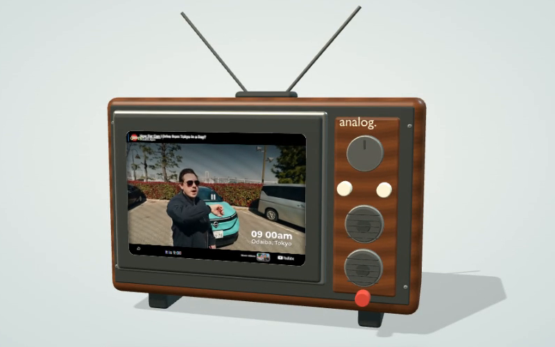Wood-textured 3D television with metal antennas, speakers, and a channel dial